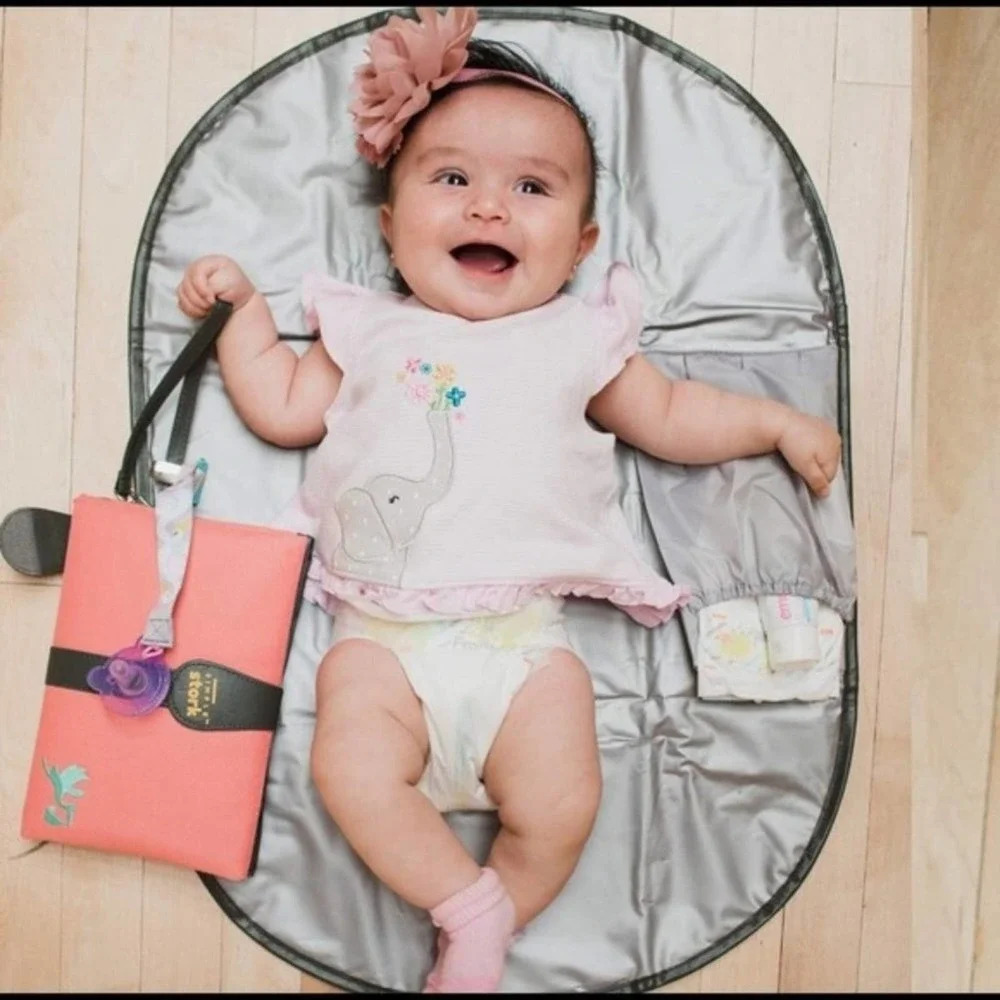 BRAND NEW portable changing pad! Amazing Size!